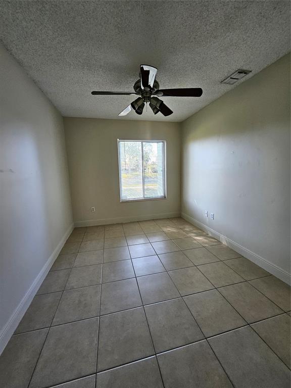 8290 Butterfield Lane Boca Raton, FL 33433 - Photo 35 of 38 a view of an empty room and window shelves