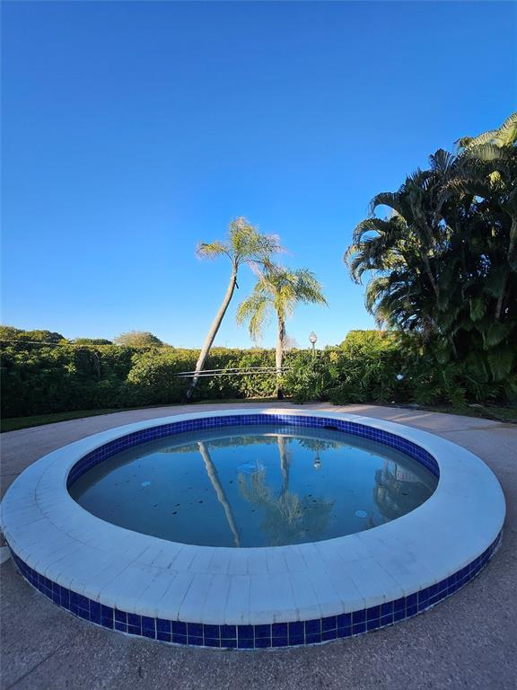 8290 Butterfield Lane Boca Raton, FL 33433 - Photo 7 of 38 a view of swimming pool having outdoor seating