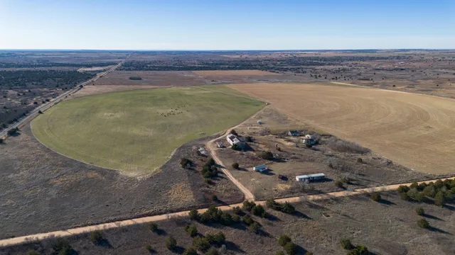 an aerial view of beach and ocean