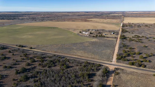 a view of a room with water heater and wooden floor