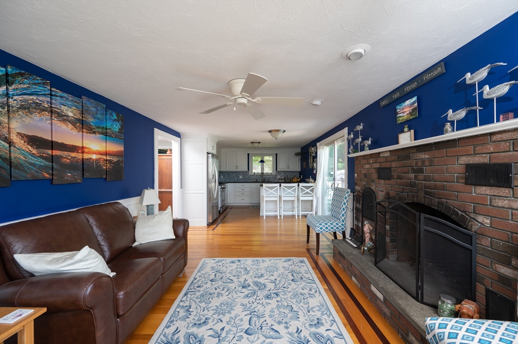 29 Wituwamat Road Weymouth, MA 02191 - Photo 8 of 42 a living room with furniture and a rug