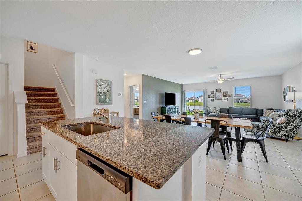 11112 Linden Depot Road San Antonio, FL 33576 - Photo 12 of 82 a kitchen with sink and center island