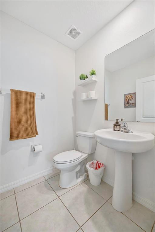 11112 Linden Depot Road San Antonio, FL 33576 - Photo 36 of 82 a bathroom with a sink and a mirror