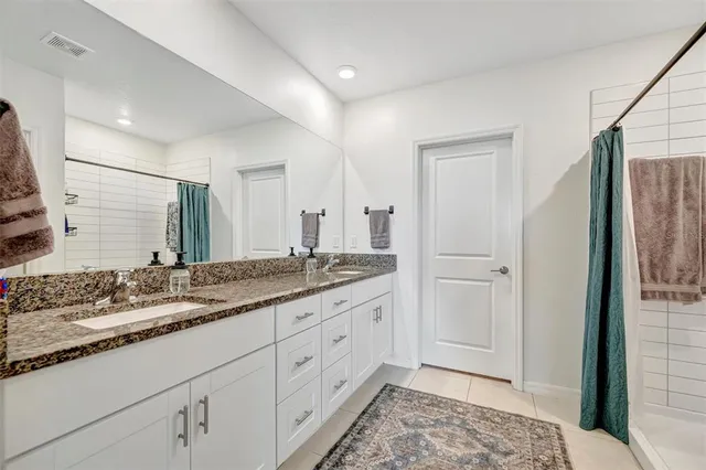 a view of a house with backyard porch and garden