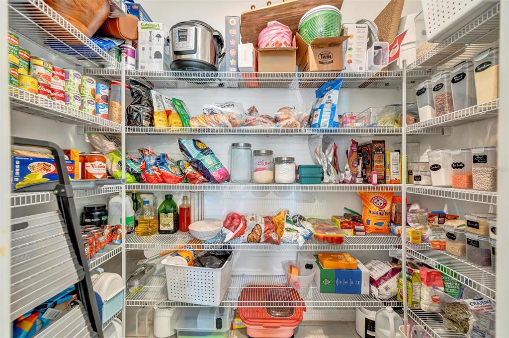 11112 Linden Depot Road San Antonio, FL 33576 - Photo 49 of 82 a store room with lots of different kinds of food