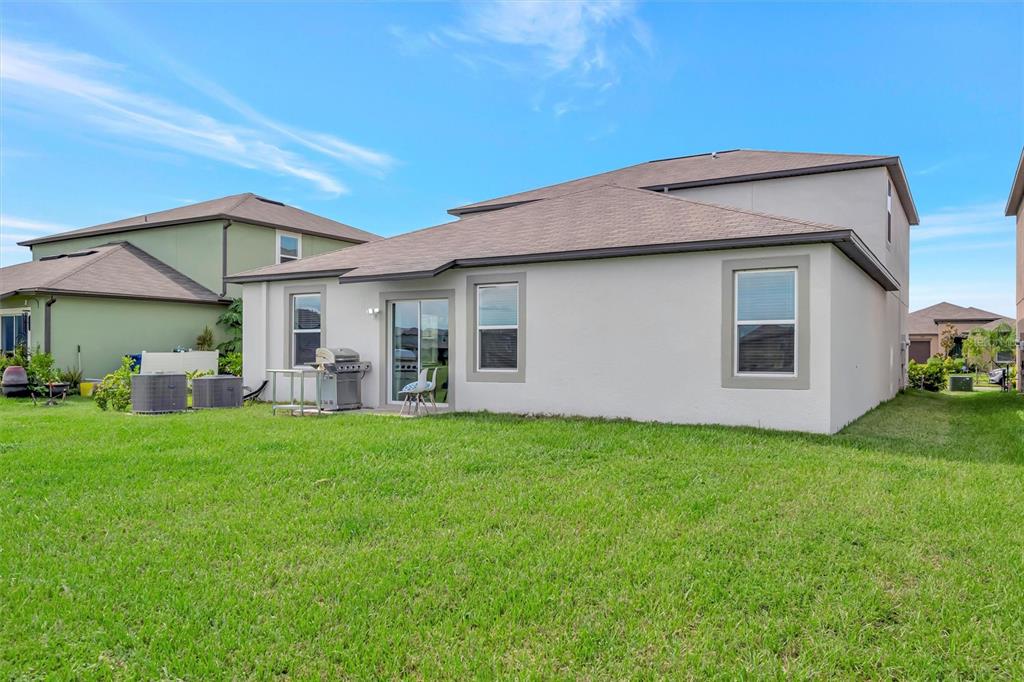 11112 Linden Depot Road San Antonio, FL 33576 - Photo 63 of 82 a front view of a house with a garden