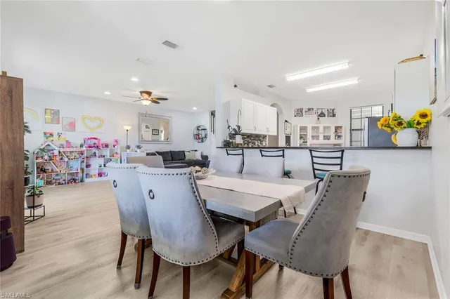 workspace with white cabinets and window