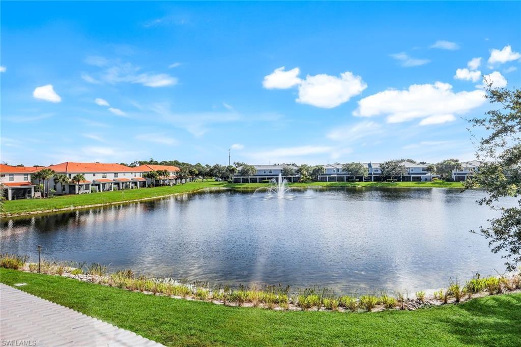 15239 Summit Pl Circle, Unit 246 Naples, FL 34119 - Photo 35 of 49 Water view featuring nearby suburban area