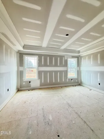 a bathroom with a tub shower vanity and a sink