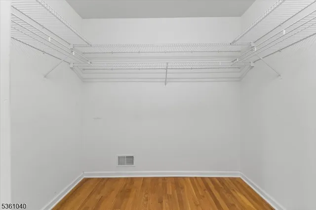 a spacious bathroom with a granite countertop tub and a sink