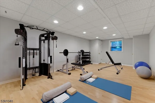 a view of an empty room with wooden walls