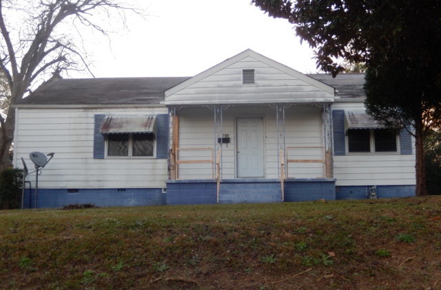 3818 Mathis Street Macon, GA 31206 - Photo 1 of 5 a view of front of house with wooden fence