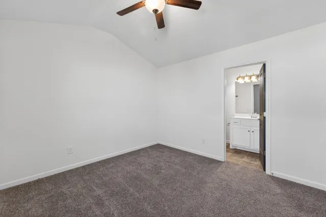 an empty room with a bathroom