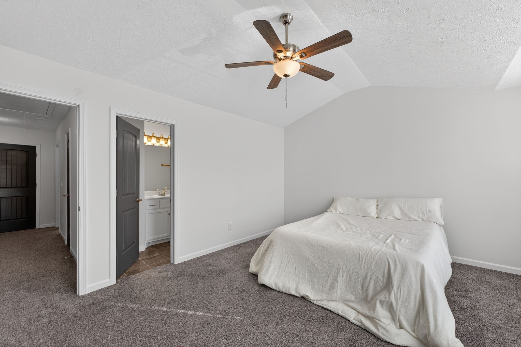 5326 Dan Post Way Murfreesboro, TN 37128 - Photo 13 of 17 a bedroom with a bed and a ceiling fan