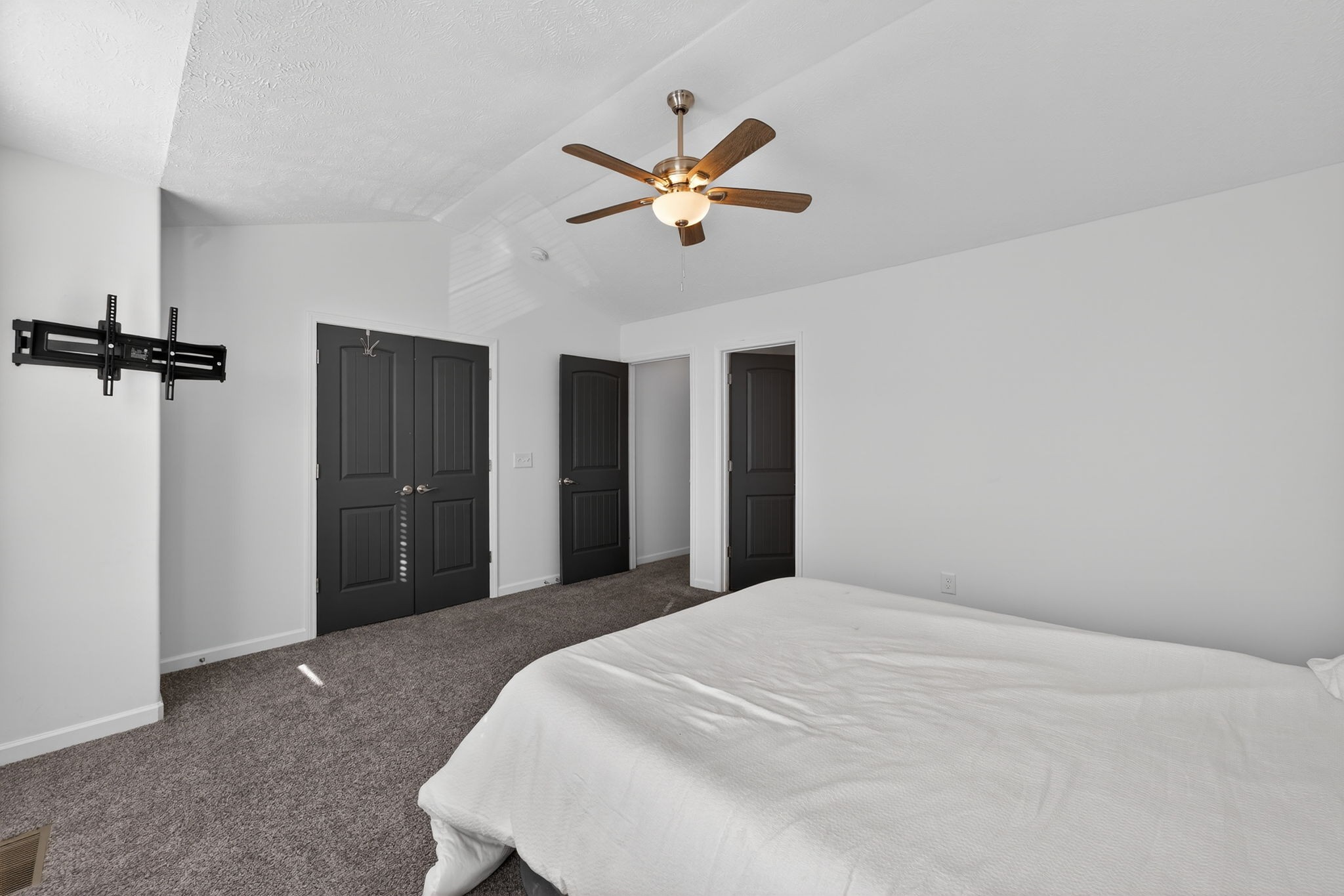 5326 Dan Post Way Murfreesboro, TN 37128 - Photo 14 of 17 a bedroom with a bed and a ceiling fan