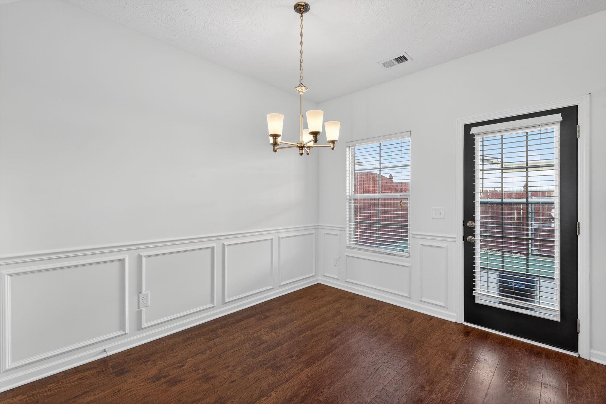 5326 Dan Post Way Murfreesboro, TN 37128 - Photo 6 of 17 a view of an empty room with a window and wooden floor