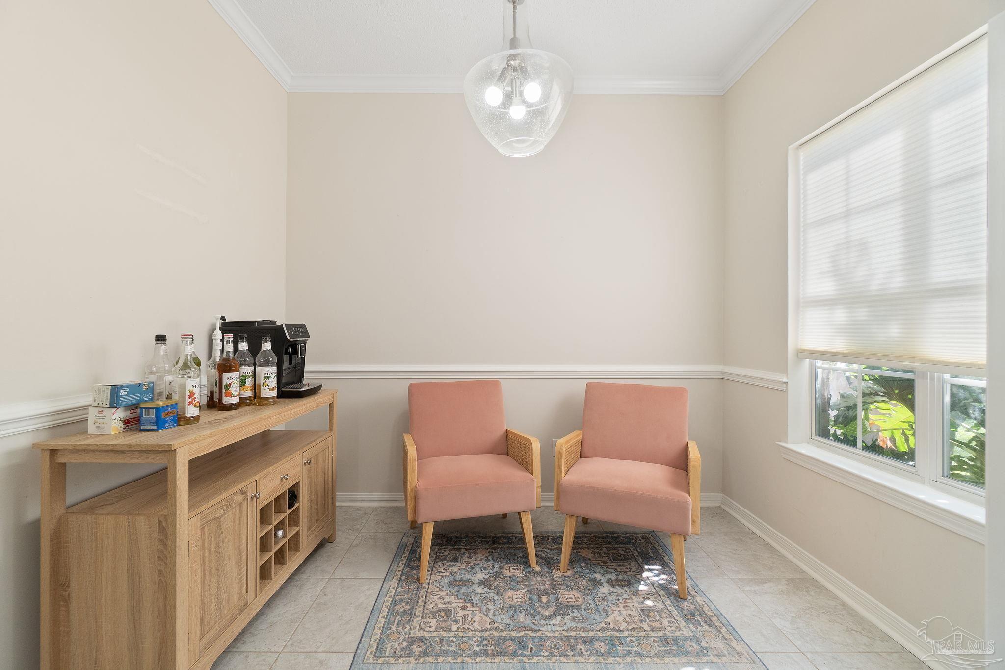 1504 Muirfield Road Cantonment, FL 32533 - Photo 17 of 35 a bedroom with a bed and a window