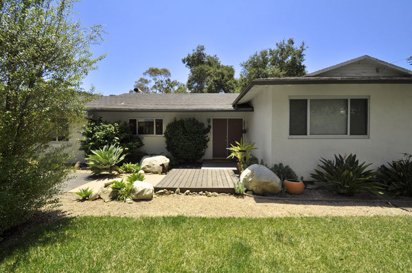 2280 Las Canoas Road Santa Barbara, CA 93105 - Photo 4 of 12 a front view of a house with a yard