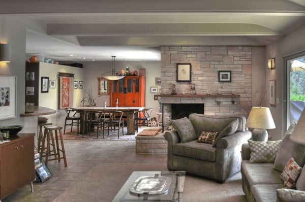 2280 Las Canoas Road Santa Barbara, CA 93105 - Photo 5 of 12 a living room with furniture a fireplace and wall paintings