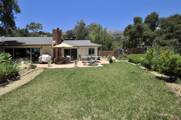 2280 Las Canoas Road Santa Barbara, CA 93105 - Photo 9 of 12 a front view of a house with garden and sitting area