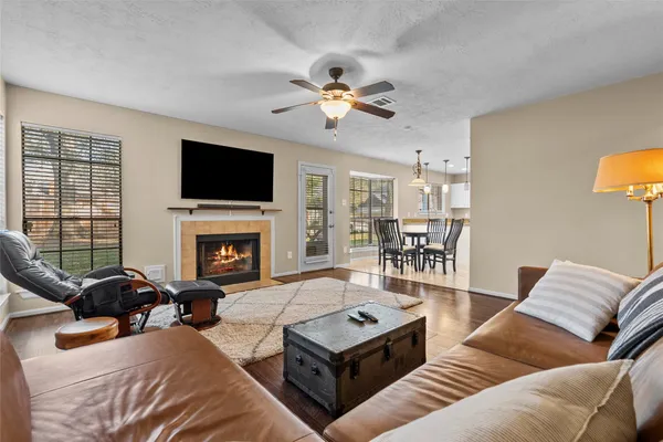 a utility room with cabinets washer and dryer