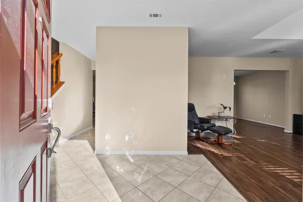 a workspace with furniture and wooden floor