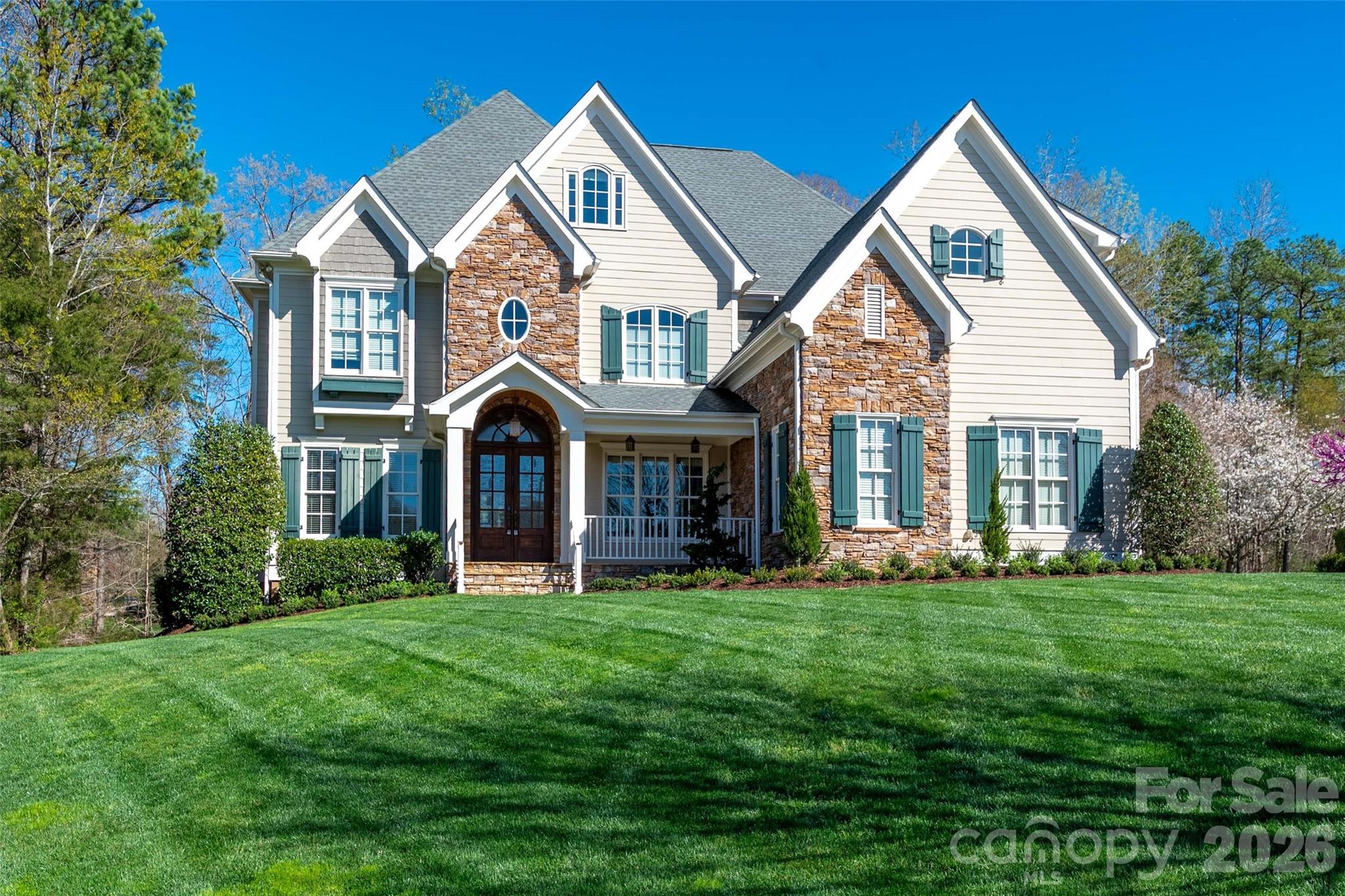 406 Belo Court Fort Mill, SC 29715 - Photo 1 of 46 a front view of a house with a yard