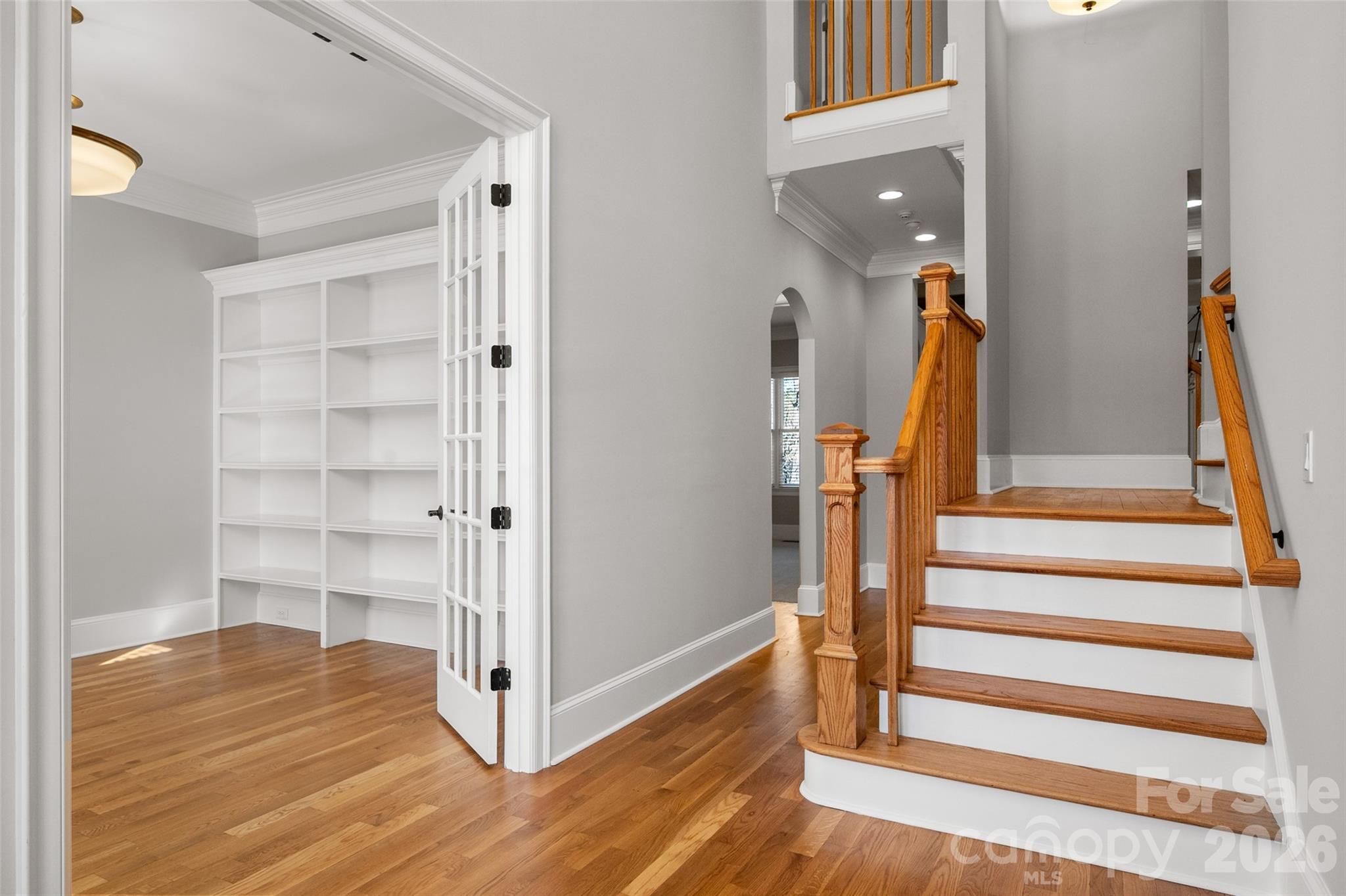 406 Belo Court Fort Mill, SC 29715 - Photo 11 of 46 a view of a hallway with wooden floor and entryway