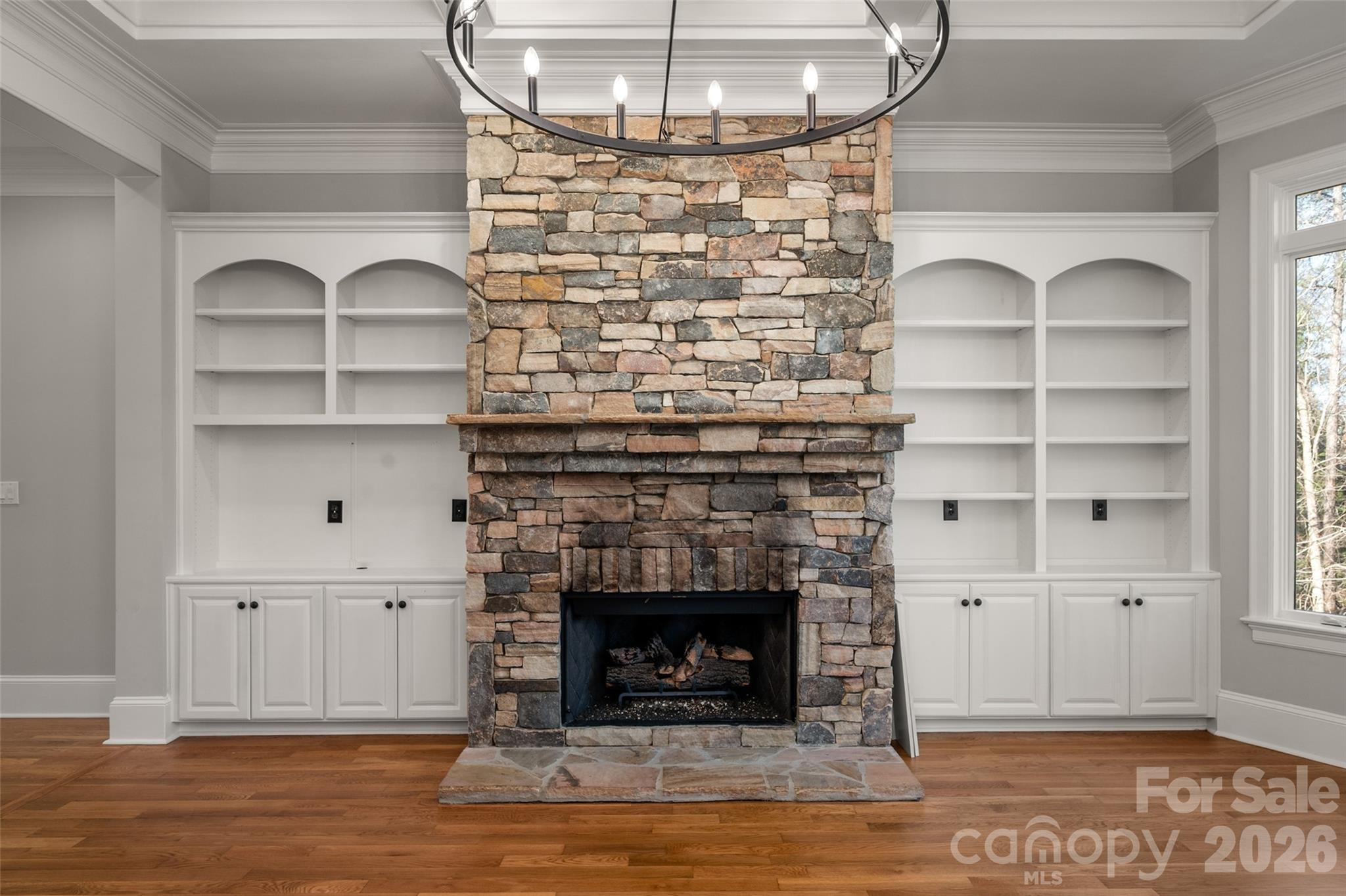 406 Belo Court Fort Mill, SC 29715 - Photo 17 of 46 a living room with a fireplace