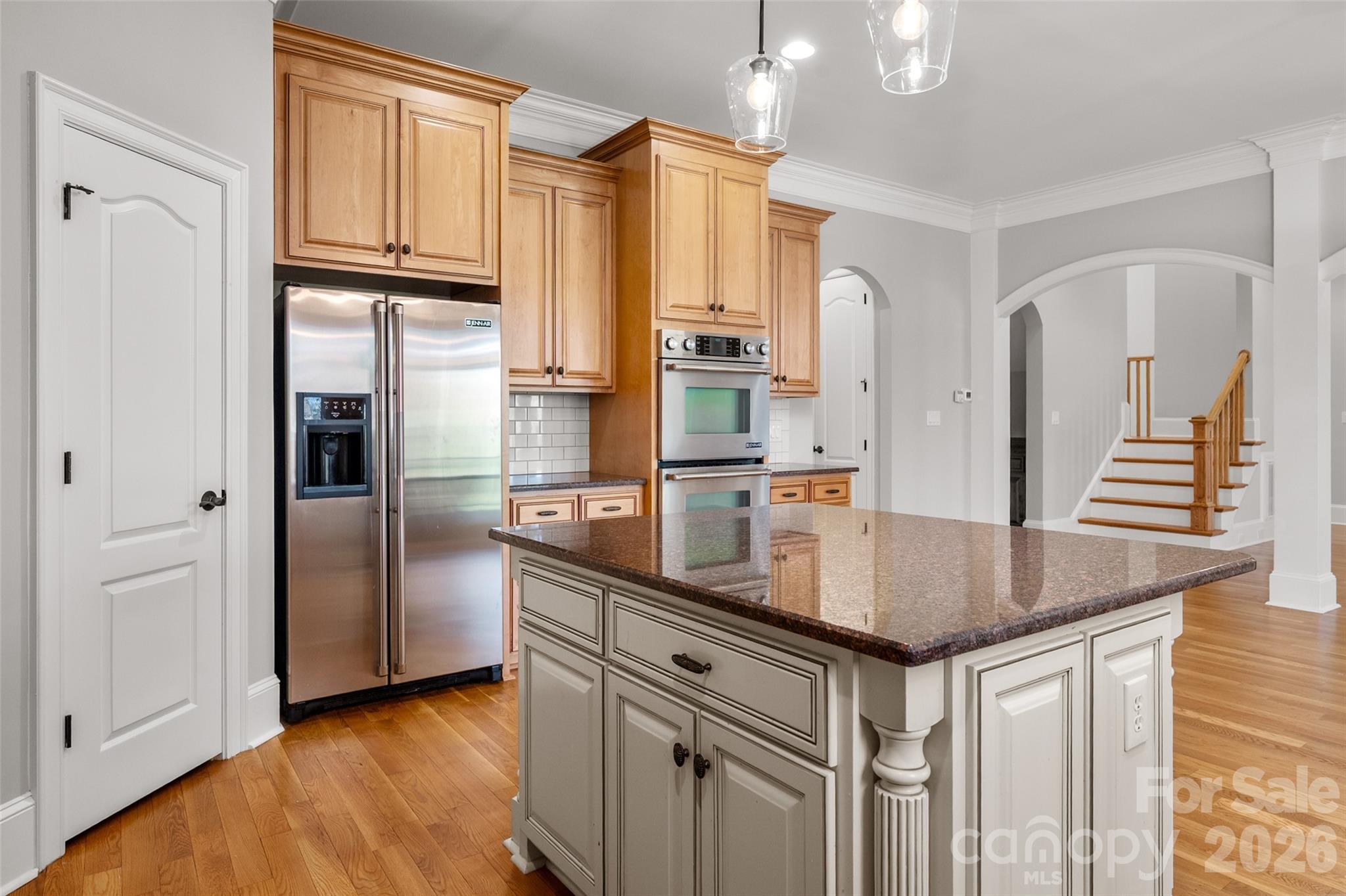 406 Belo Court Fort Mill, SC 29715 - Photo 22 of 46 a kitchen with stainless steel appliances granite countertop a refrigerator and a sink