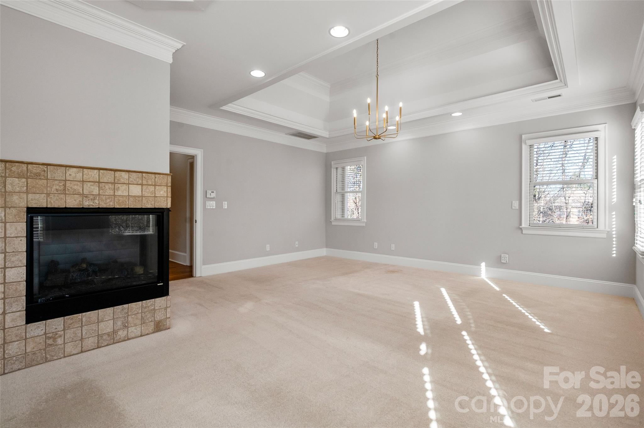 406 Belo Court Fort Mill, SC 29715 - Photo 30 of 46 a view of an empty room with window and fire place