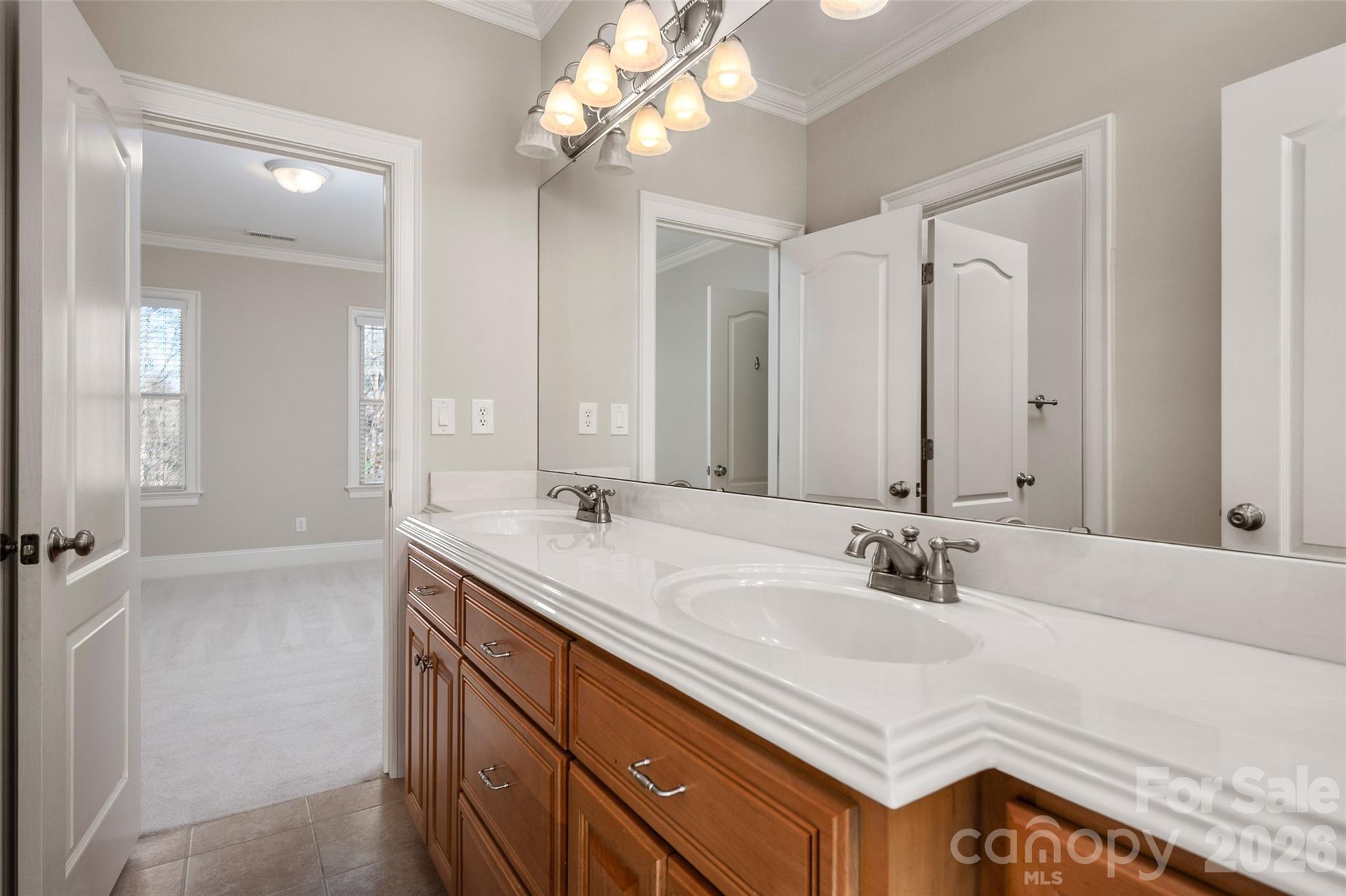 406 Belo Court Fort Mill, SC 29715 - Photo 37 of 46 a bathroom with a sink double vanity and a mirror
