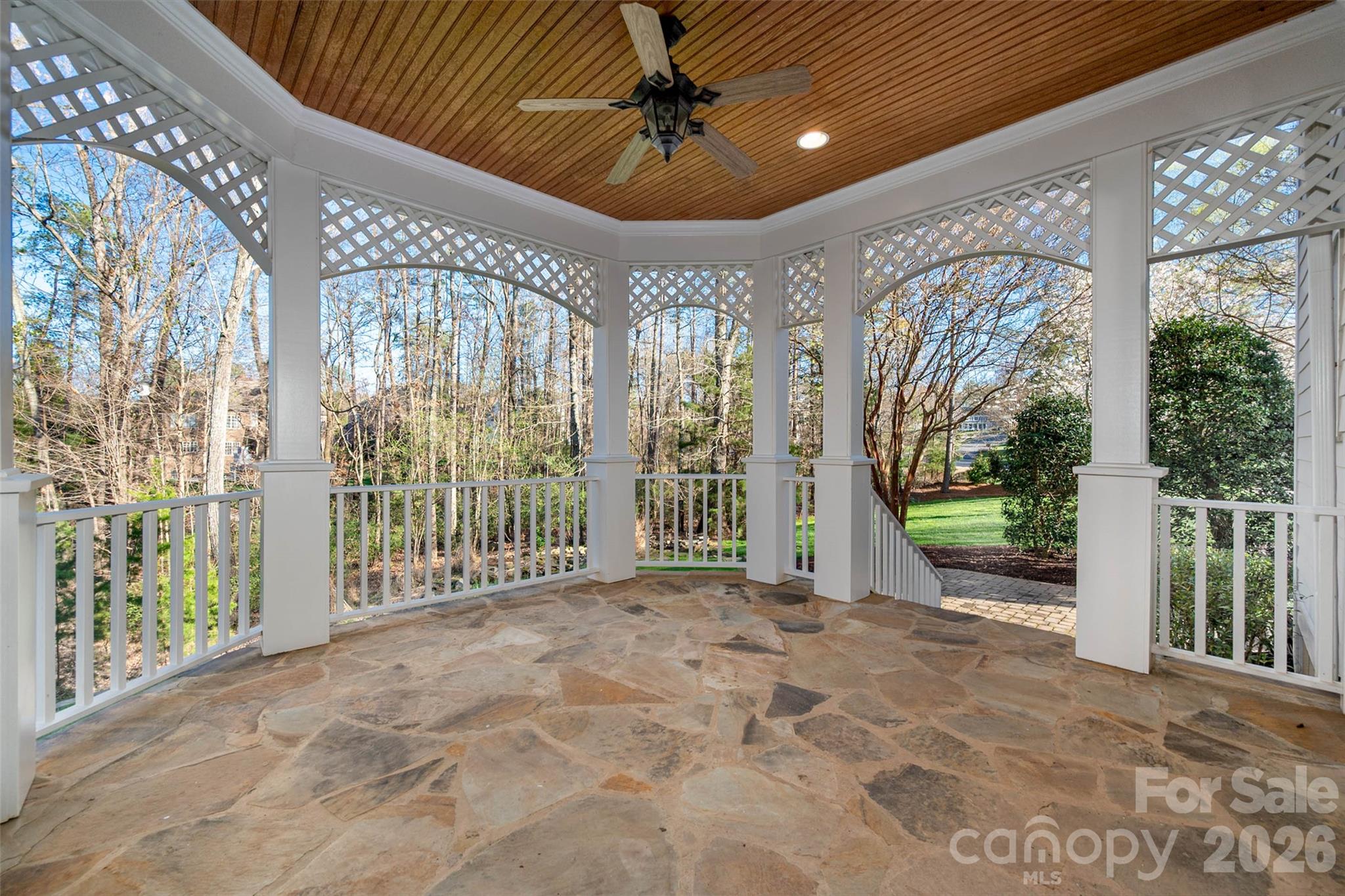 406 Belo Court Fort Mill, SC 29715 - Photo 42 of 46 a view of a porch with a garden