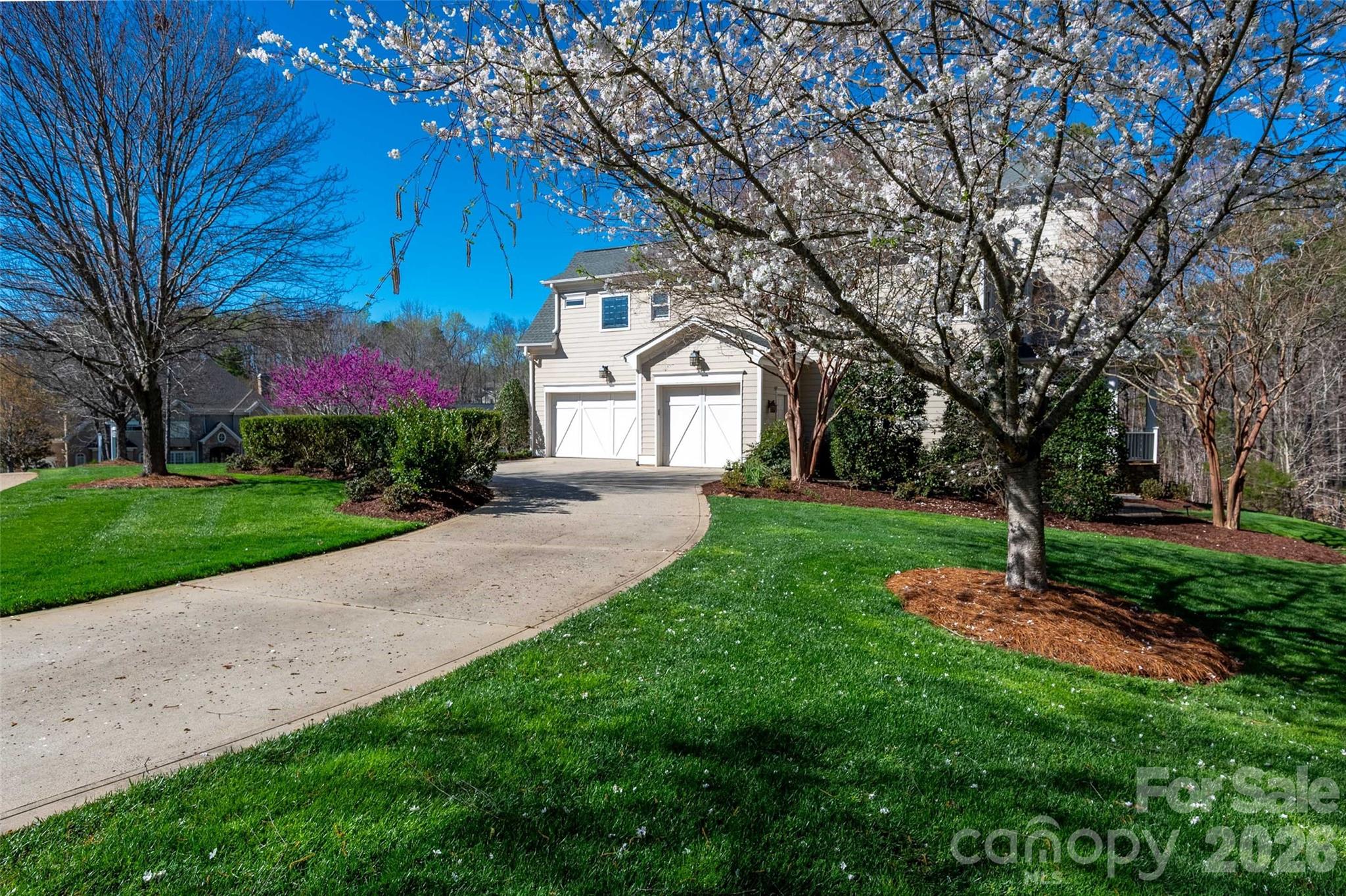 406 Belo Court Fort Mill, SC 29715 - Photo 45 of 46 a front view of a house with a garden