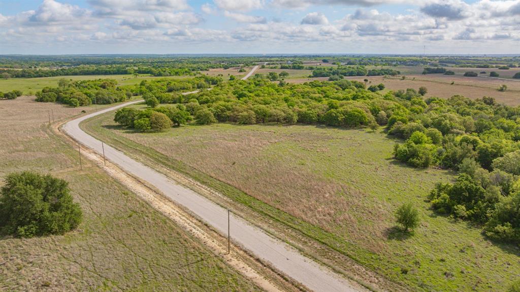 27 State Avenue Stephenville, TX 76401 - Photo 24 of 40 a view of a lake with an outdoor space