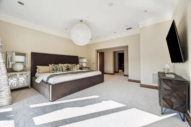 a spacious bathroom with a granite countertop sink mirror and a bathtub