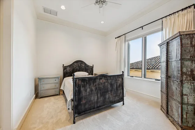 a kitchen with stainless steel appliances granite countertop a sink a stove and wooden floor