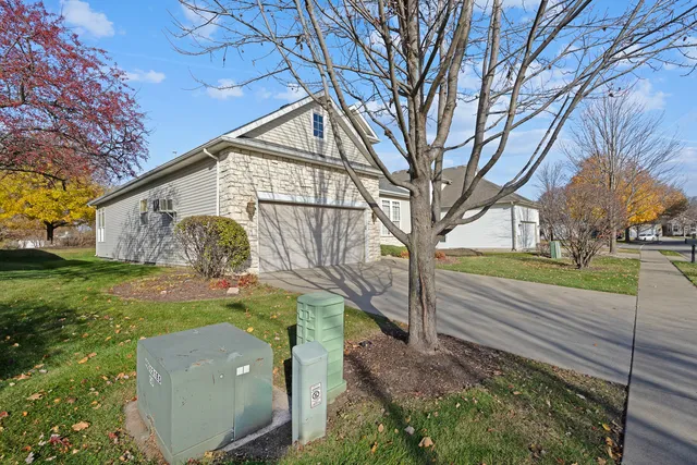 a view of a house with a yard