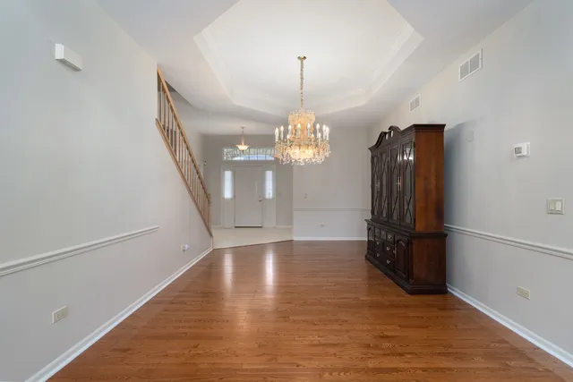 a view of a livingroom with wooden floor
