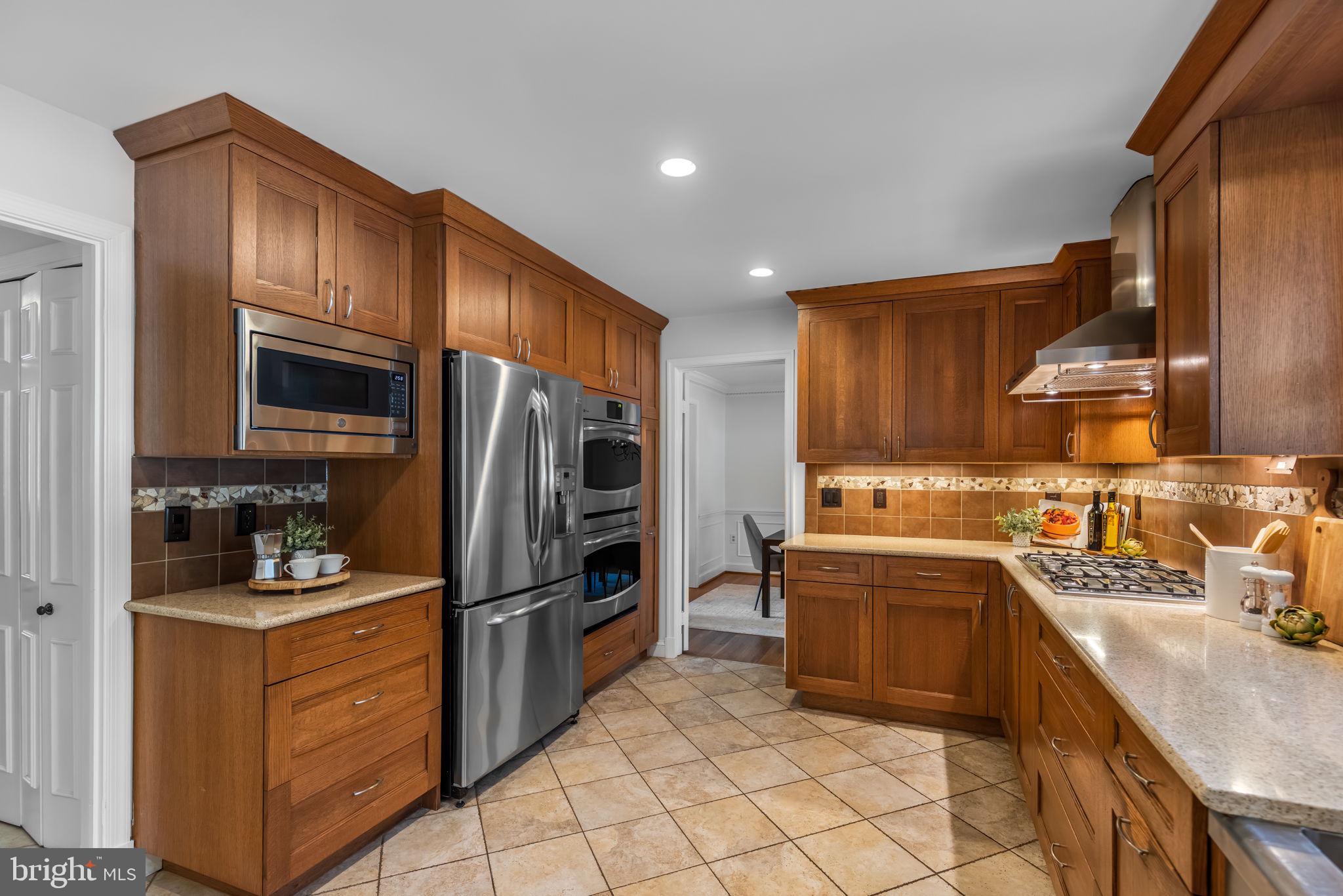 7105 Devonshire Road Alexandria, VA 22307 - Photo 18 of 54 Expansive eat-in kitchen, stainless & granite