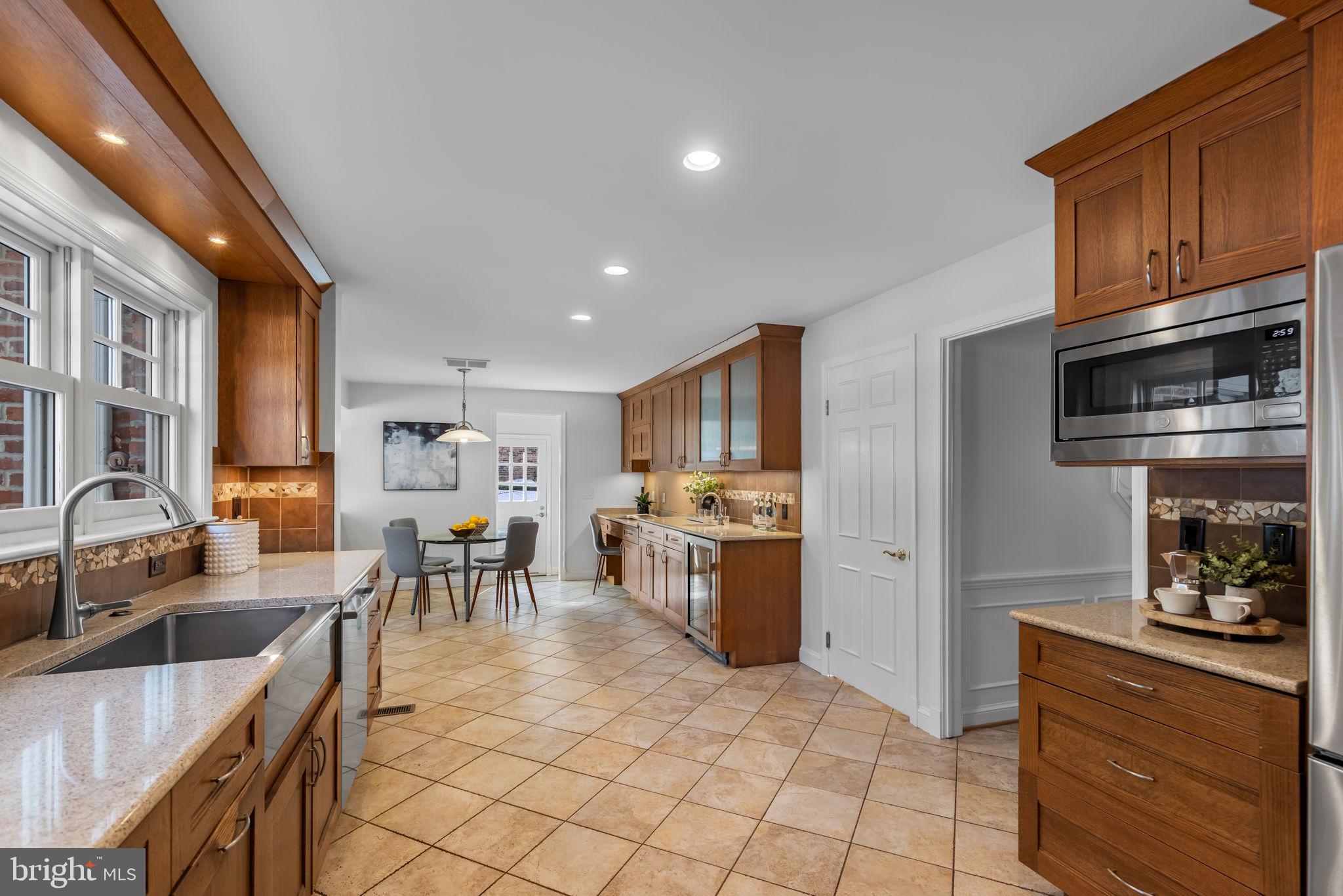 7105 Devonshire Road Alexandria, VA 22307 - Photo 19 of 54 Expansive eat-in kitchen, stainless & granite