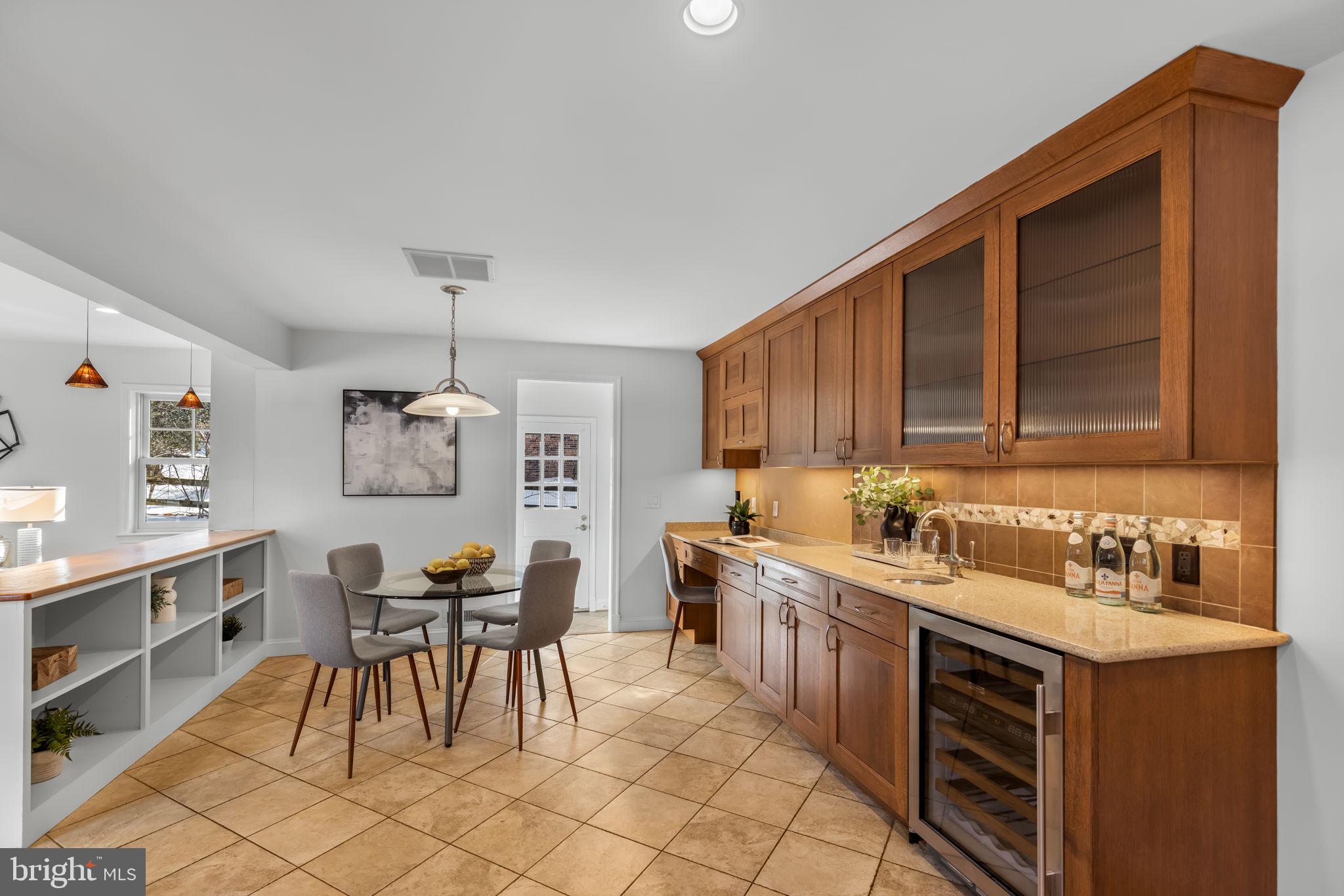 7105 Devonshire Road Alexandria, VA 22307 - Photo 22 of 54 Breakfast nook w wine fridge & built-ins