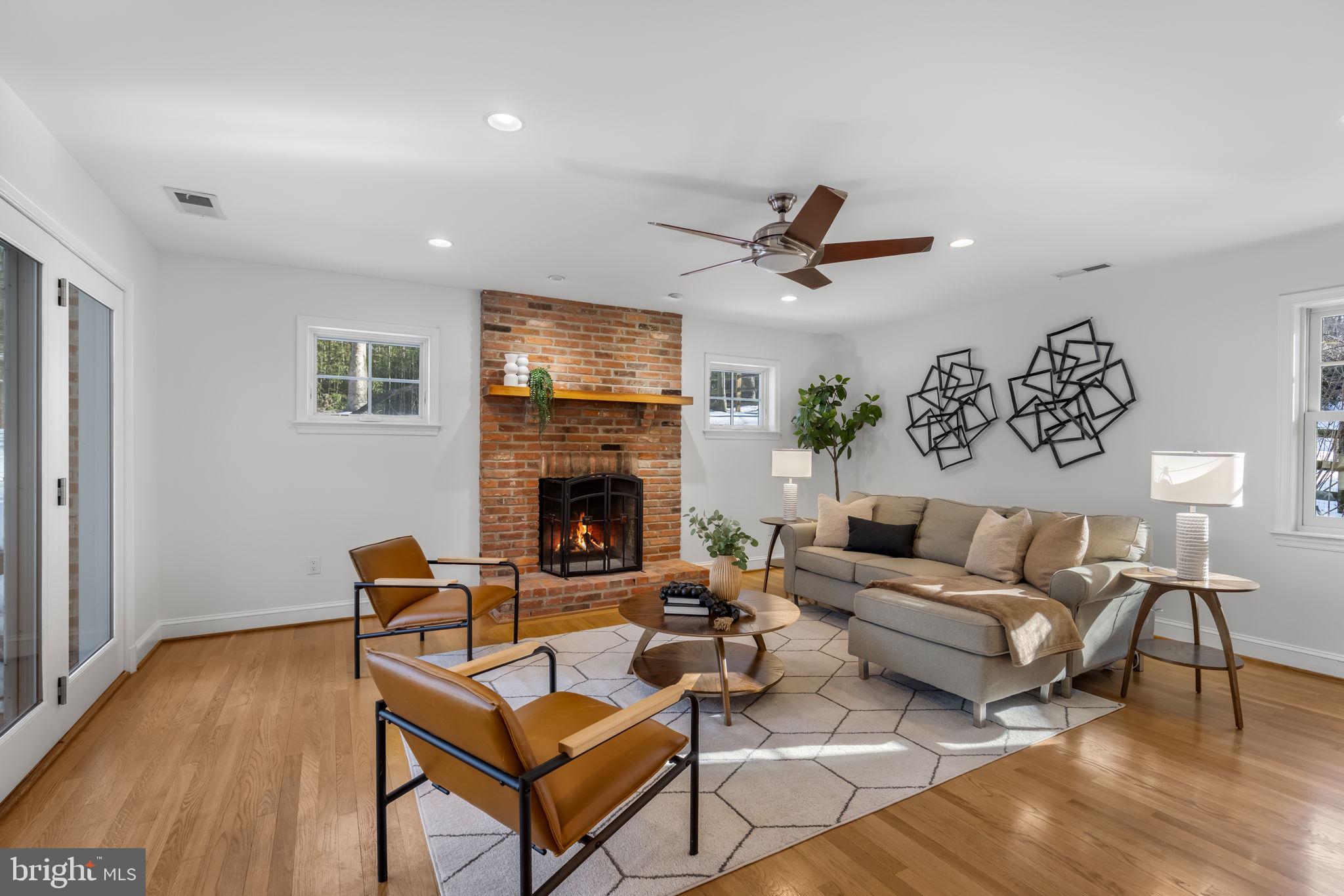 7105 Devonshire Road Alexandria, VA 22307 - Photo 25 of 54 Family room addition with fireplace