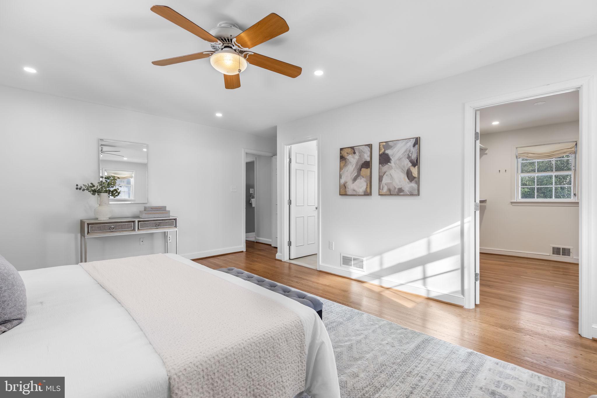 7105 Devonshire Road Alexandria, VA 22307 - Photo 31 of 54 Ensuite Primary Bedroom with custom walk-in closet