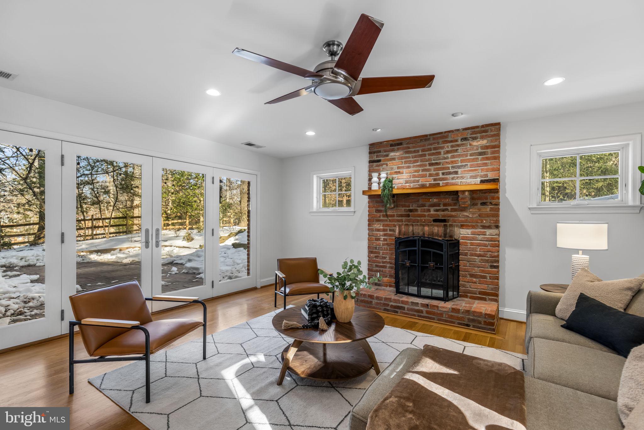 7105 Devonshire Road Alexandria, VA 22307 - Photo 6 of 54 Family room addition with fireplace