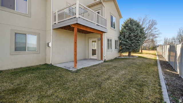 45 North 970 W Street Orem, UT 84057 - Photo 37 of 45 Rear view of property deck and patio entrance into the basement