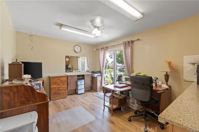 a room with furniture and a flat screen tv