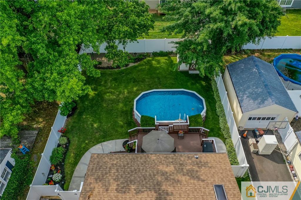36 West Cliff Road Colonia, NJ 07067 - Photo 36 of 40 an aerial view of a house with garden space and street view