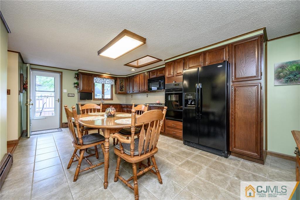 36 West Cliff Road Colonia, NJ 07067 - Photo 8 of 40 a dining room with furniture and window