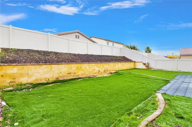a view of a house with a big yard